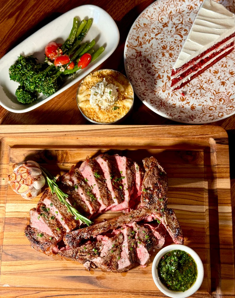 Sliced Porterhouse steak with accompaniments