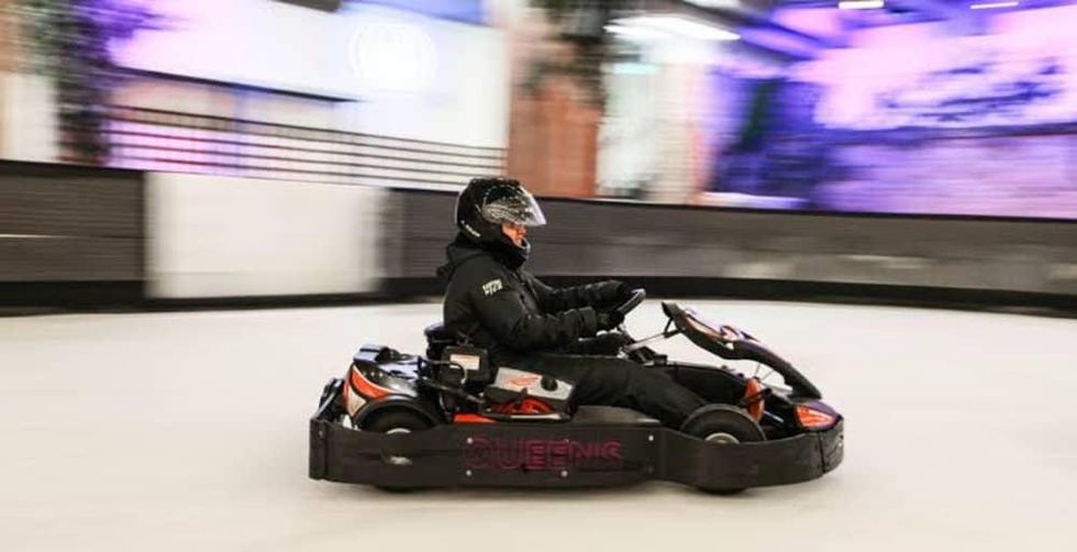 Someone races a Go Kart on ice