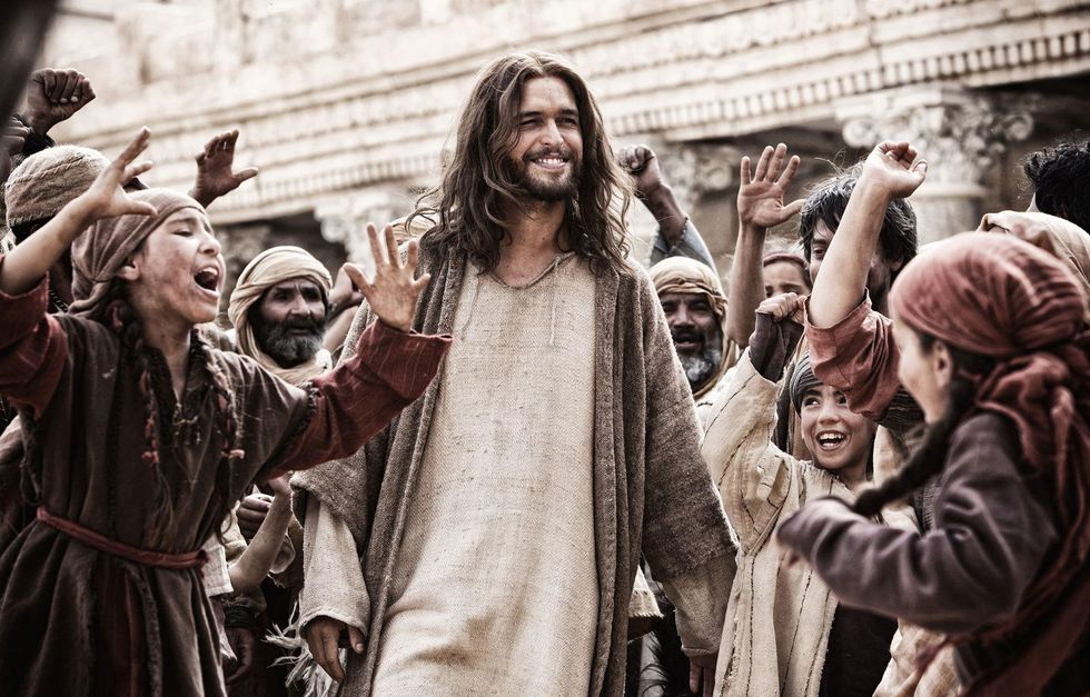 Son of God Diego Morgado as Jesus walking through crowd