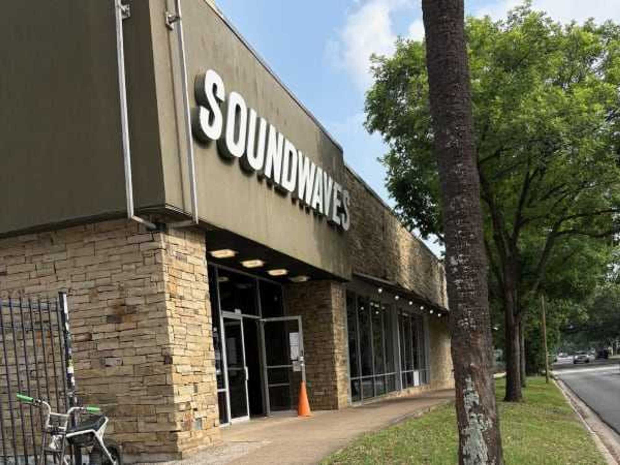 Soundwaves record store closing sign