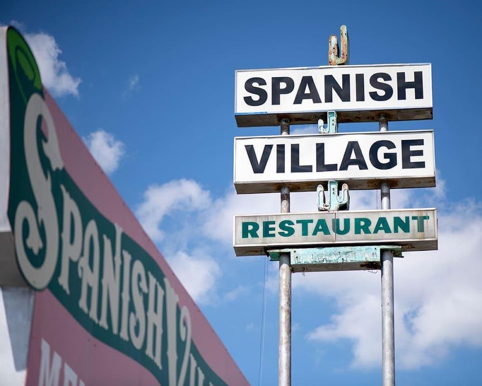 Spanish Village restaurant sign