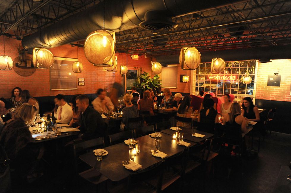 Sparrow Bar + Cookshop interior with people