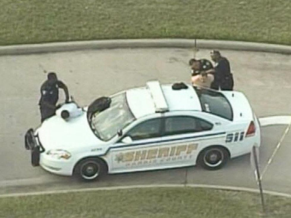 stabbing at Spring High School man held by police September 2013 RUN FLAT