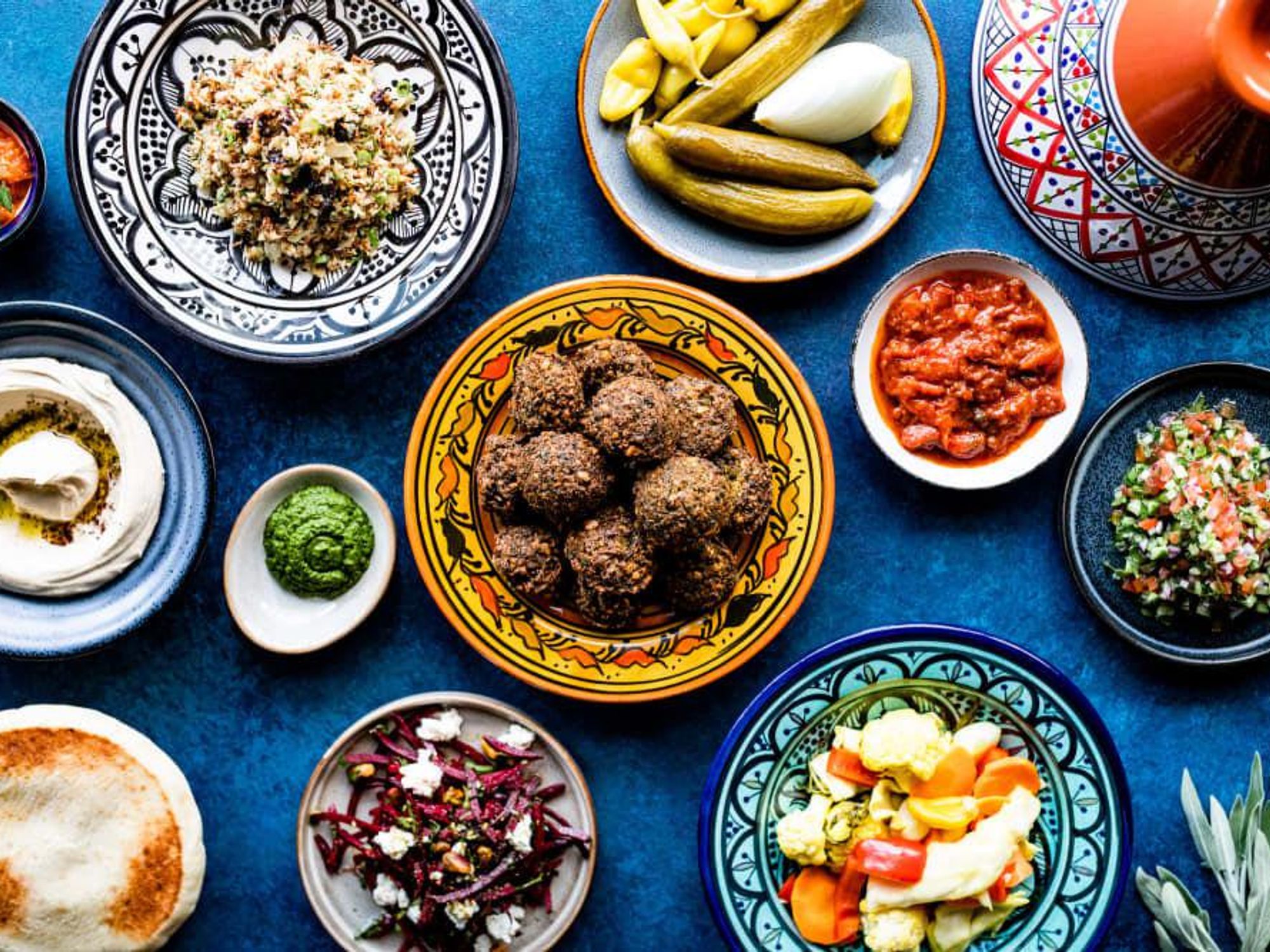 Start with salatim, small vegetable plates.