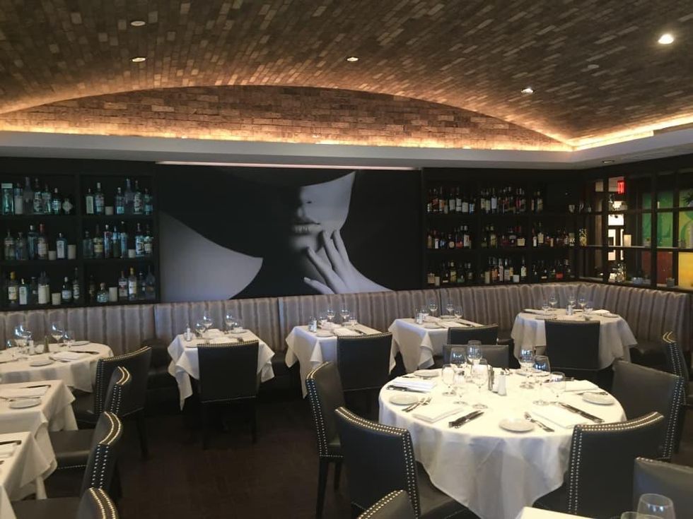 Steak 48 dining room liquor wall