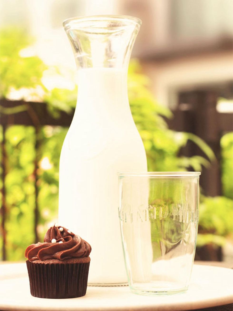 Stella Bakes RED Dessert Dive & Coffee Shop is opening in The Heights in Spring 2014 November 2013 cupcake on table with milk