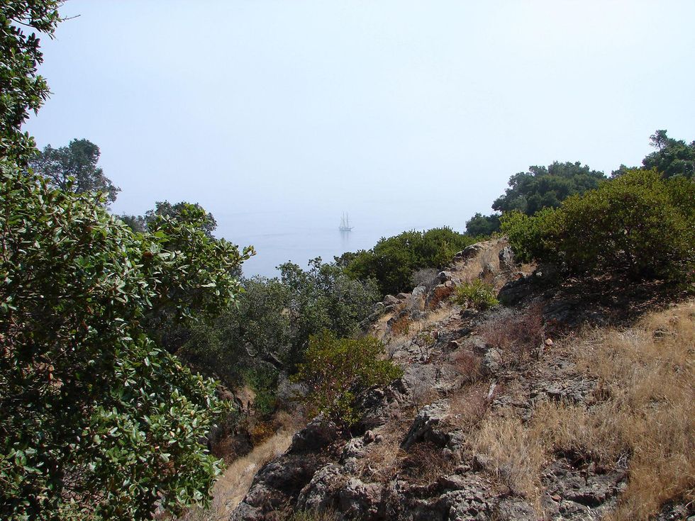 Stephan Lorenz Channel Islands January 2014 Sailboat anchored in a calm bay off Santa Cruz Island