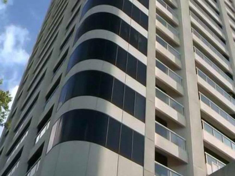 stiletto heel stabbing to death Museum District condo June 2013 RUN FLAT