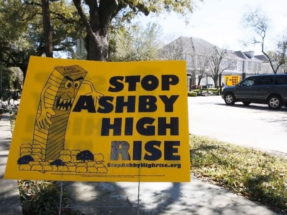 Stop Ashby highrise high-rise sign with mean tower