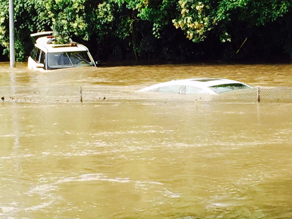 Submerged cars on Memorial near Shepherd after flooding
