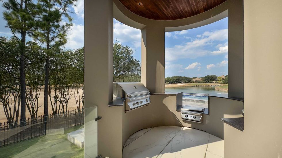 Summer kitchen of 3102 Noble Lakes Lane showing lakeside views