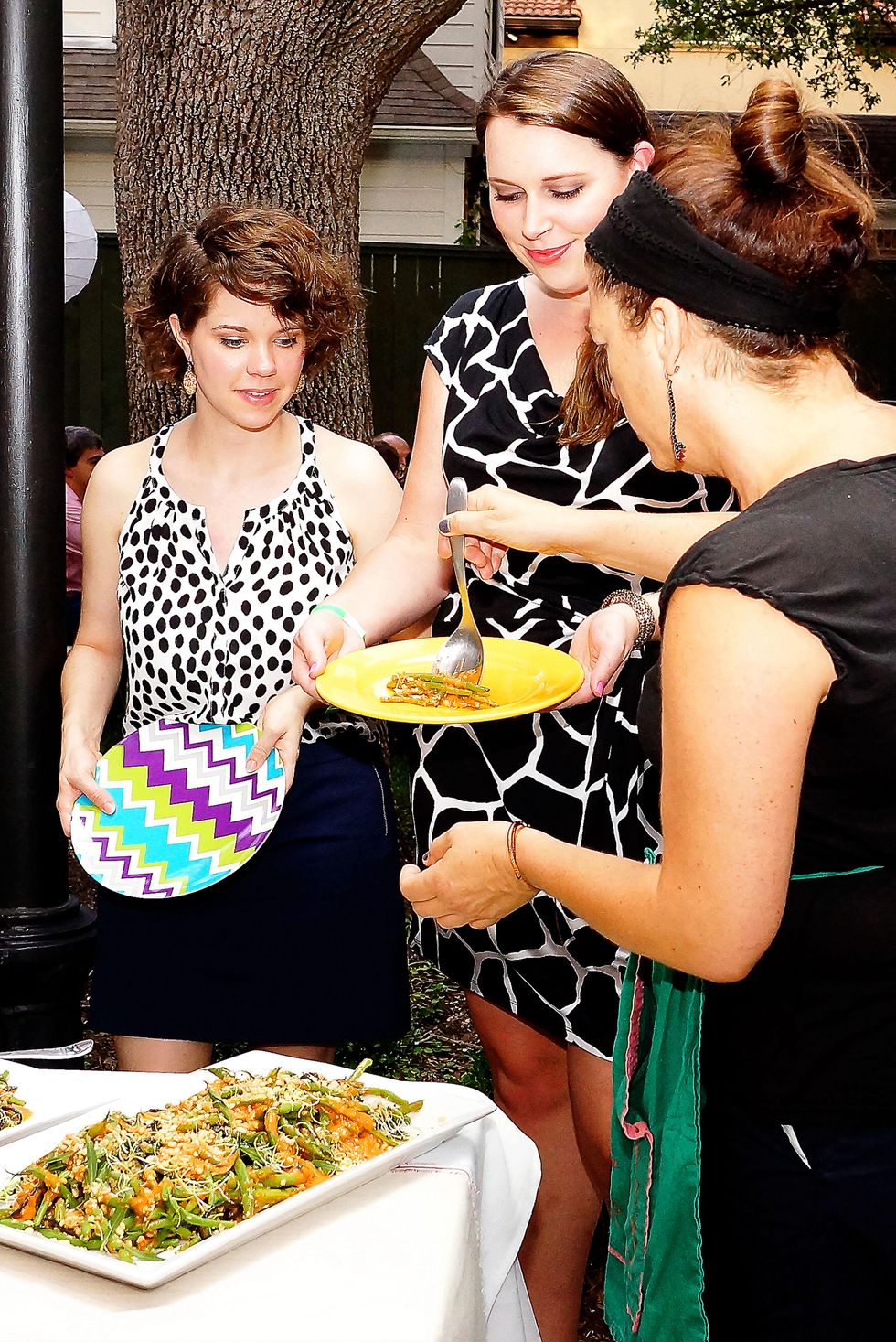 Sunday Supper with Monica Pope August 2013 guests outside being served