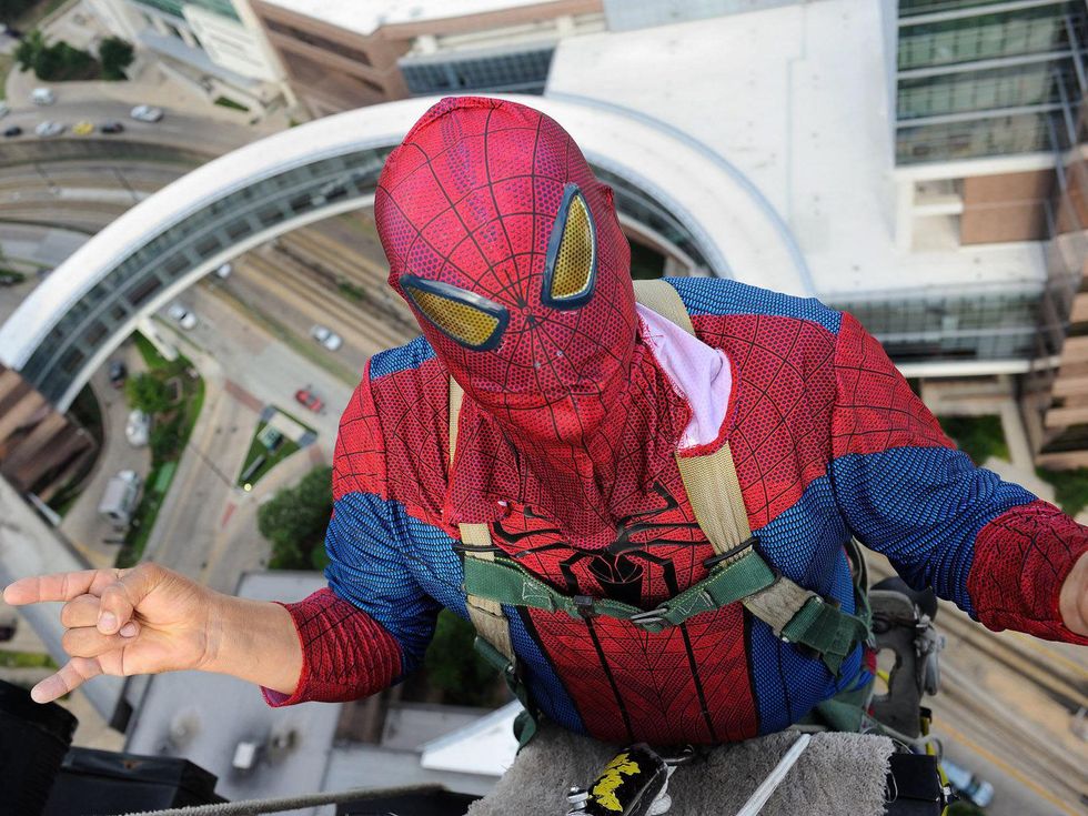 Superhero window washers surprise patients at Texas Children's Hospital