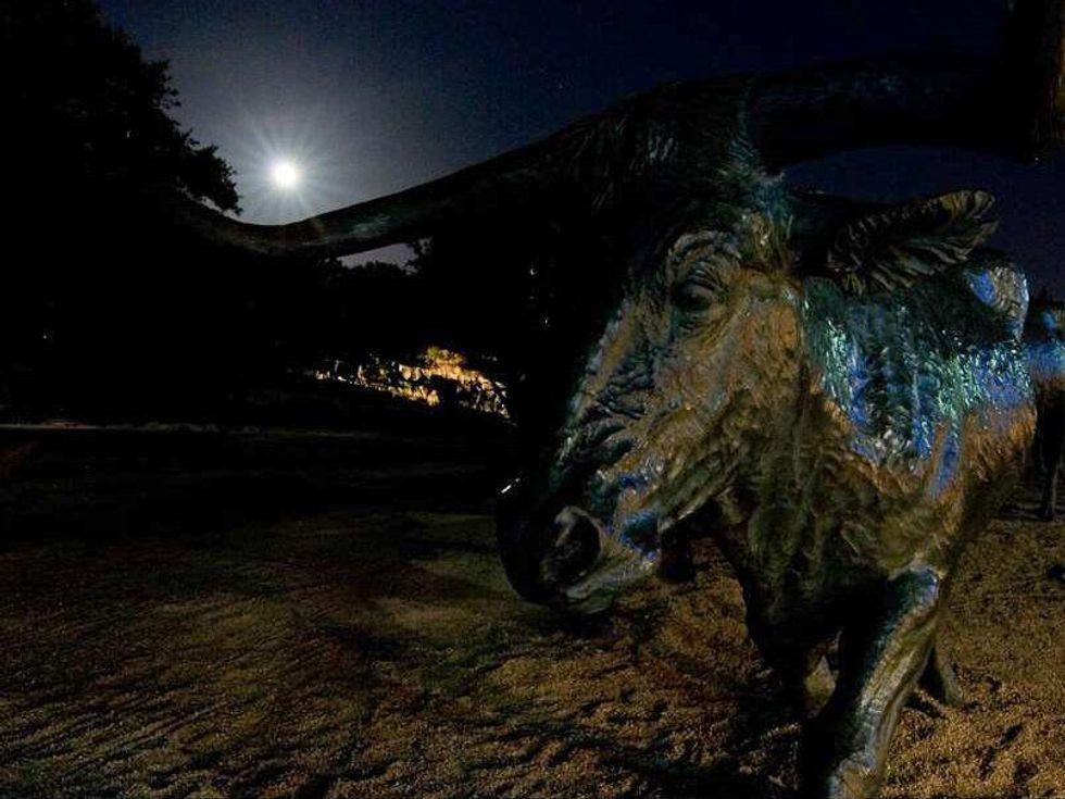 supermoon from Pioneer Plaza in downtown Dallas June 2013