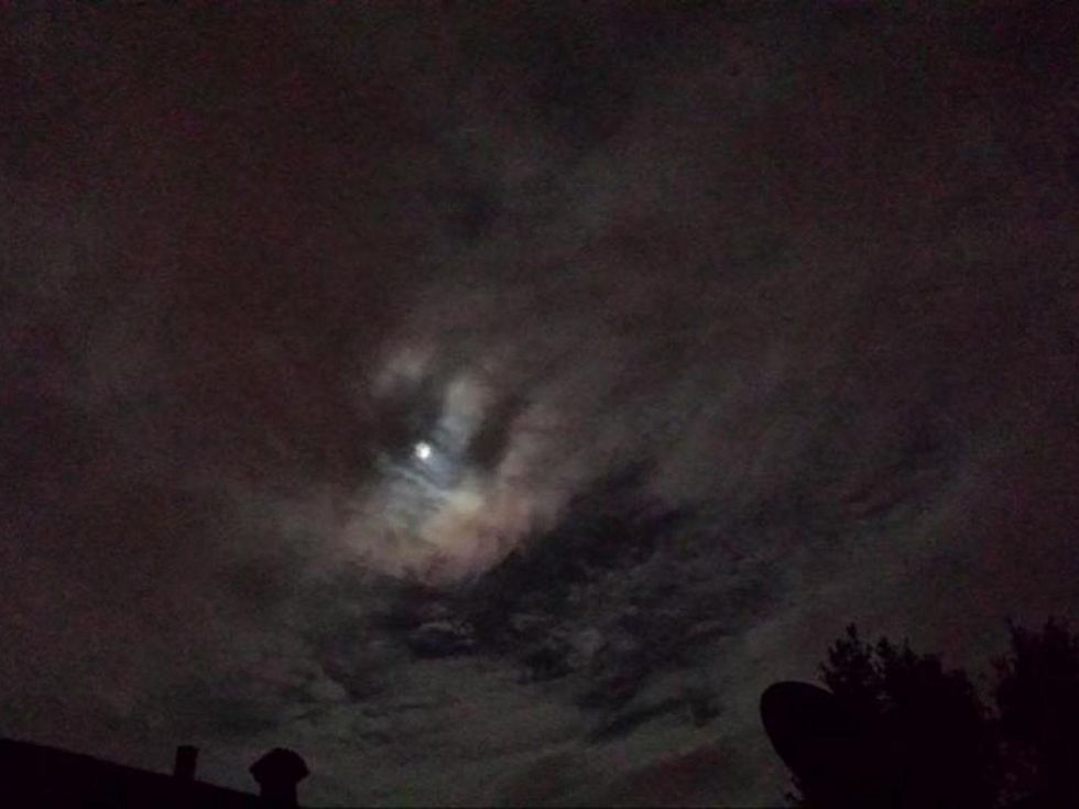 #supermoon getting covered by clouds over Houston...