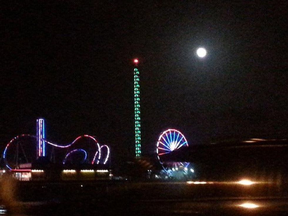 supermoon over Pleasure Pier in Galveston June 2013