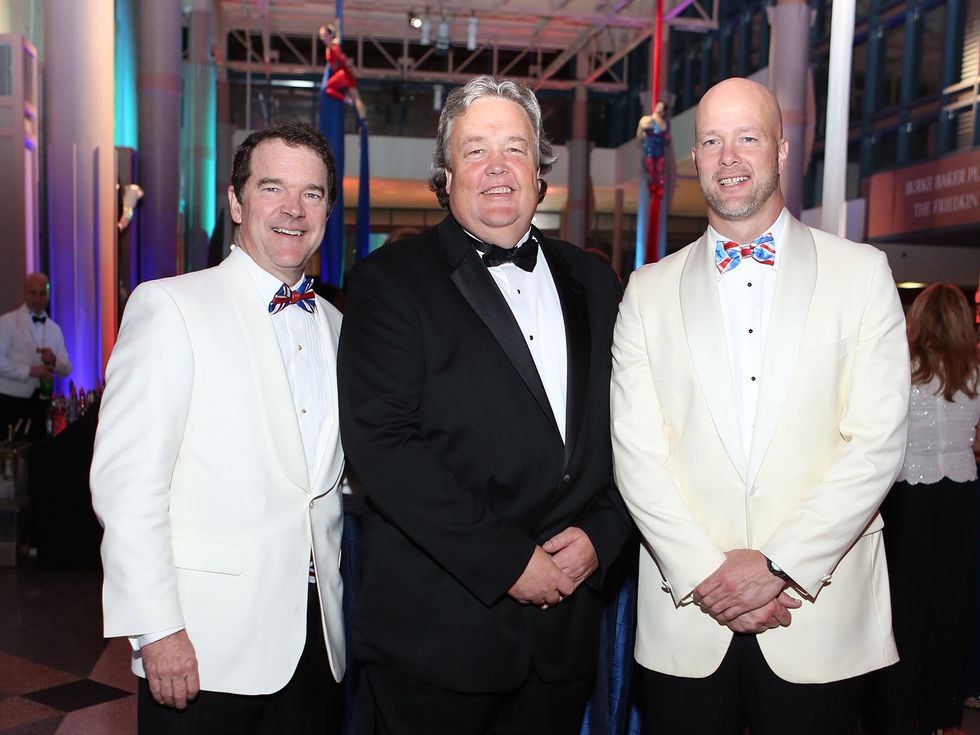 T. Mark Kelly, from left, Joel A. Bartsch and Maynard Holt at the Museum of Natural Science Gala March 2014