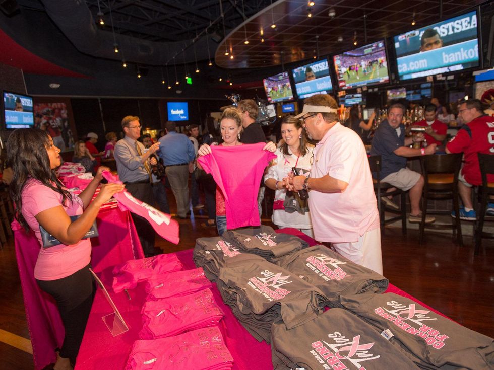 Tailgating for a Cure hosted by Houston Texans Johnathan Joseph and Kareem Jackson October 2013 T-shirts on sale at the event