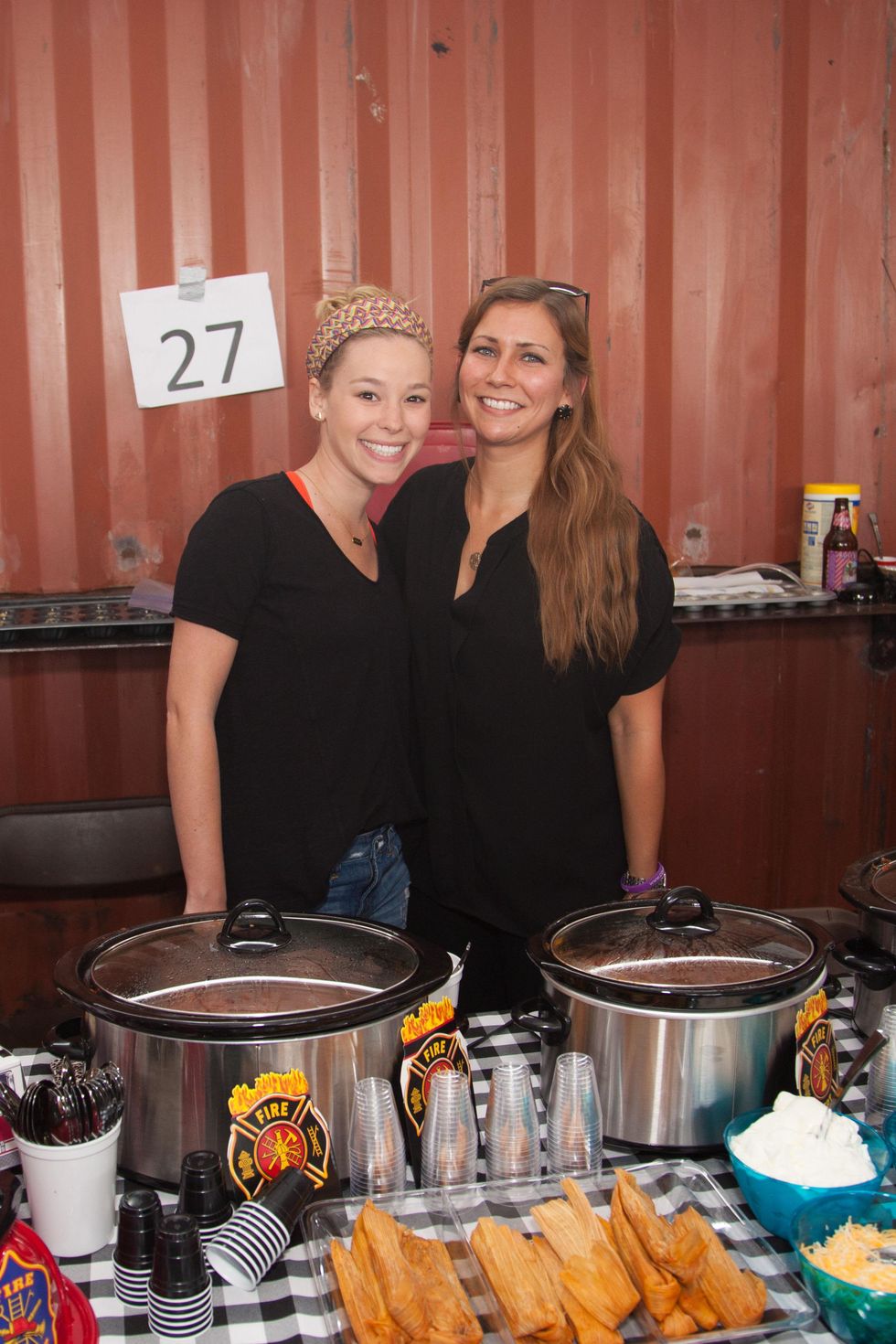 Tara Lopez, left, and Christina Mullin at the Casa de Esperanza's Young Professionals 5th Annual Chili Cook Off February 2015