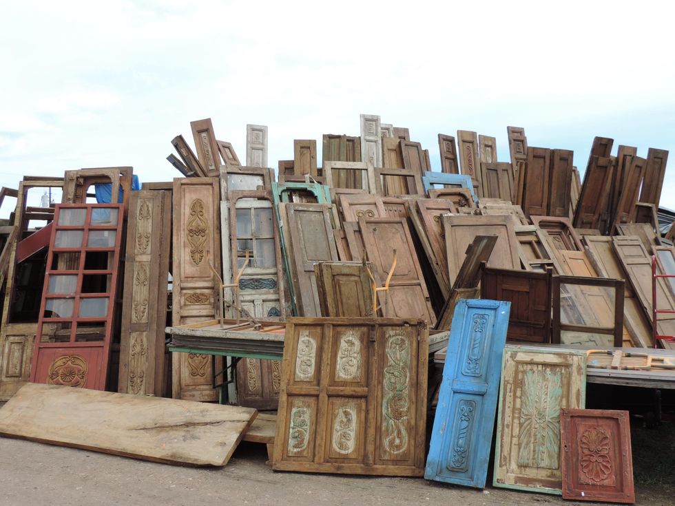 Tarra Gaines Antique Week beginner's guide March 2015 Pile of doors