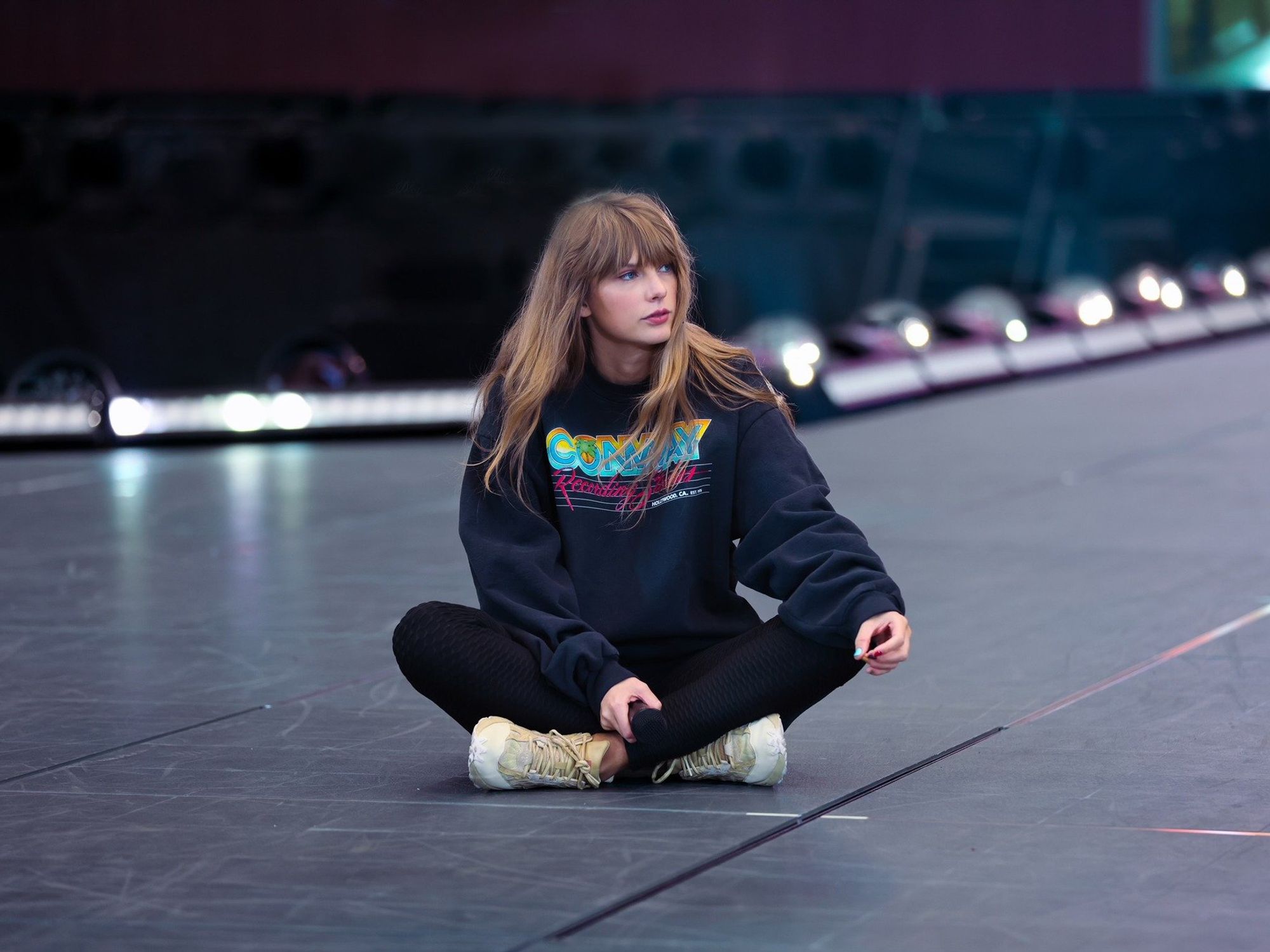 Taylor Swift sweatshirt sitting