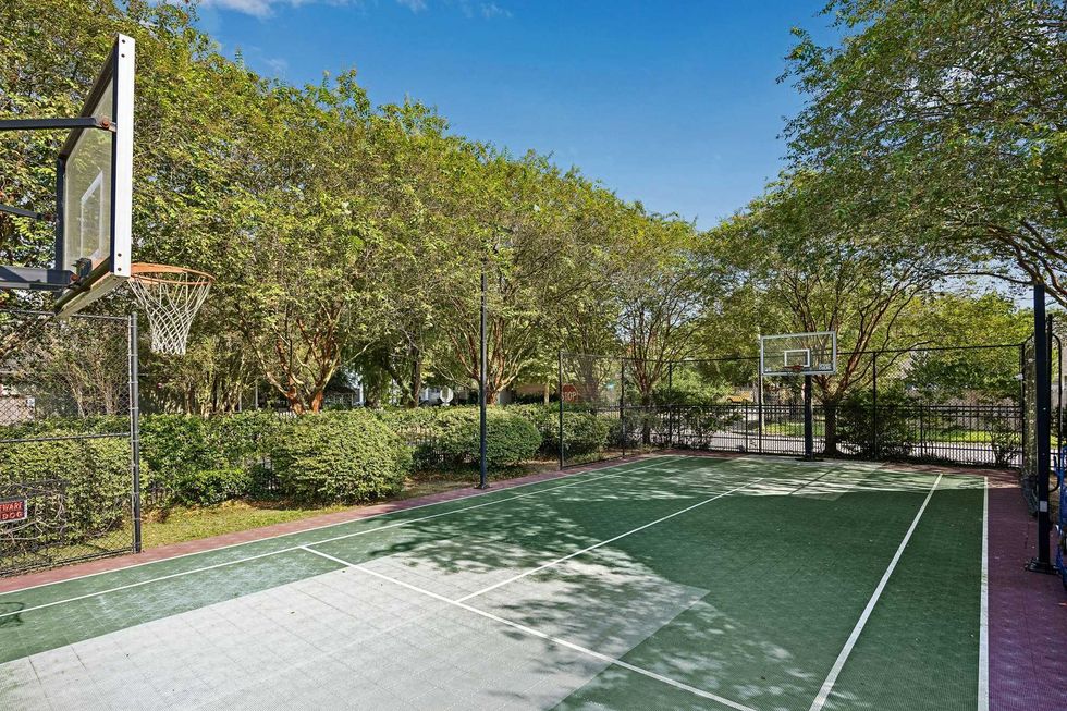 Tennis and basketball court of 216 E. 26th St. in the Heights