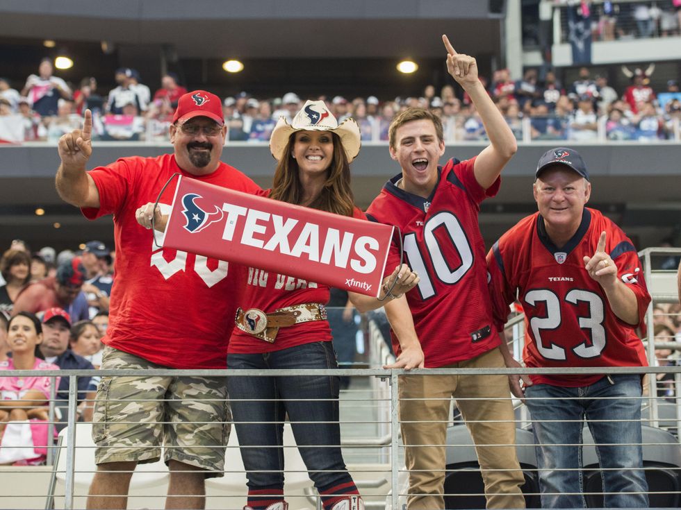 Texans vs. Cowboys Oct. 5, 2014 Texans fans with Texans sign in stands