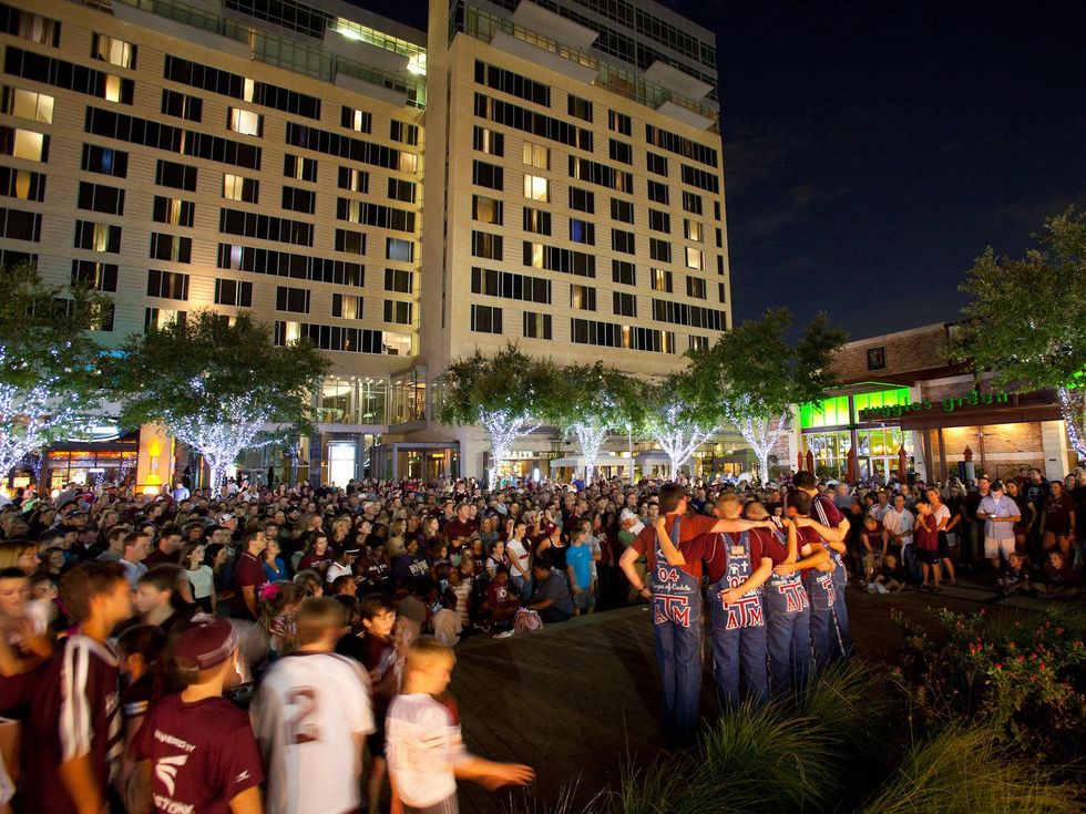 Texas A&M yell practice at CityCentre September 2013 crowd venue