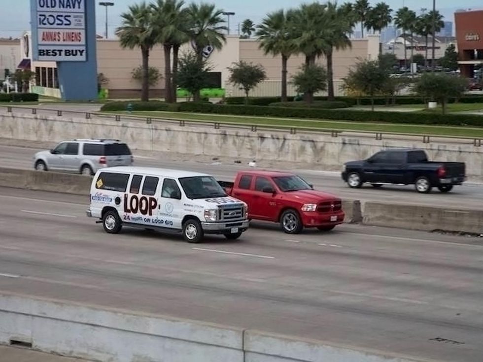The Art Guys Loop van on highway November 2013