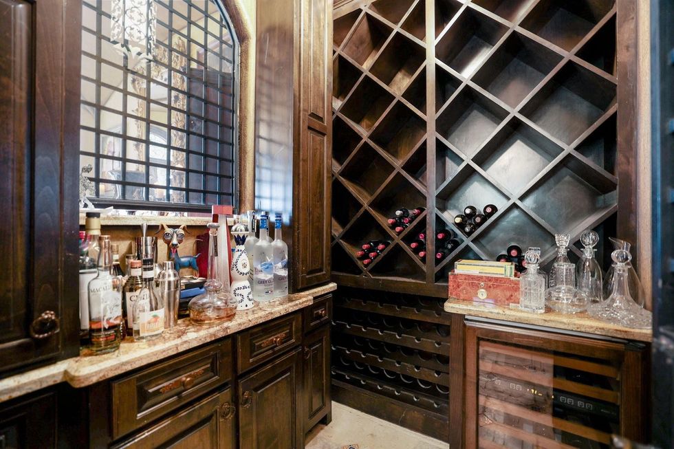 The bar in the wine room of 5007 Cedar Creek Drive