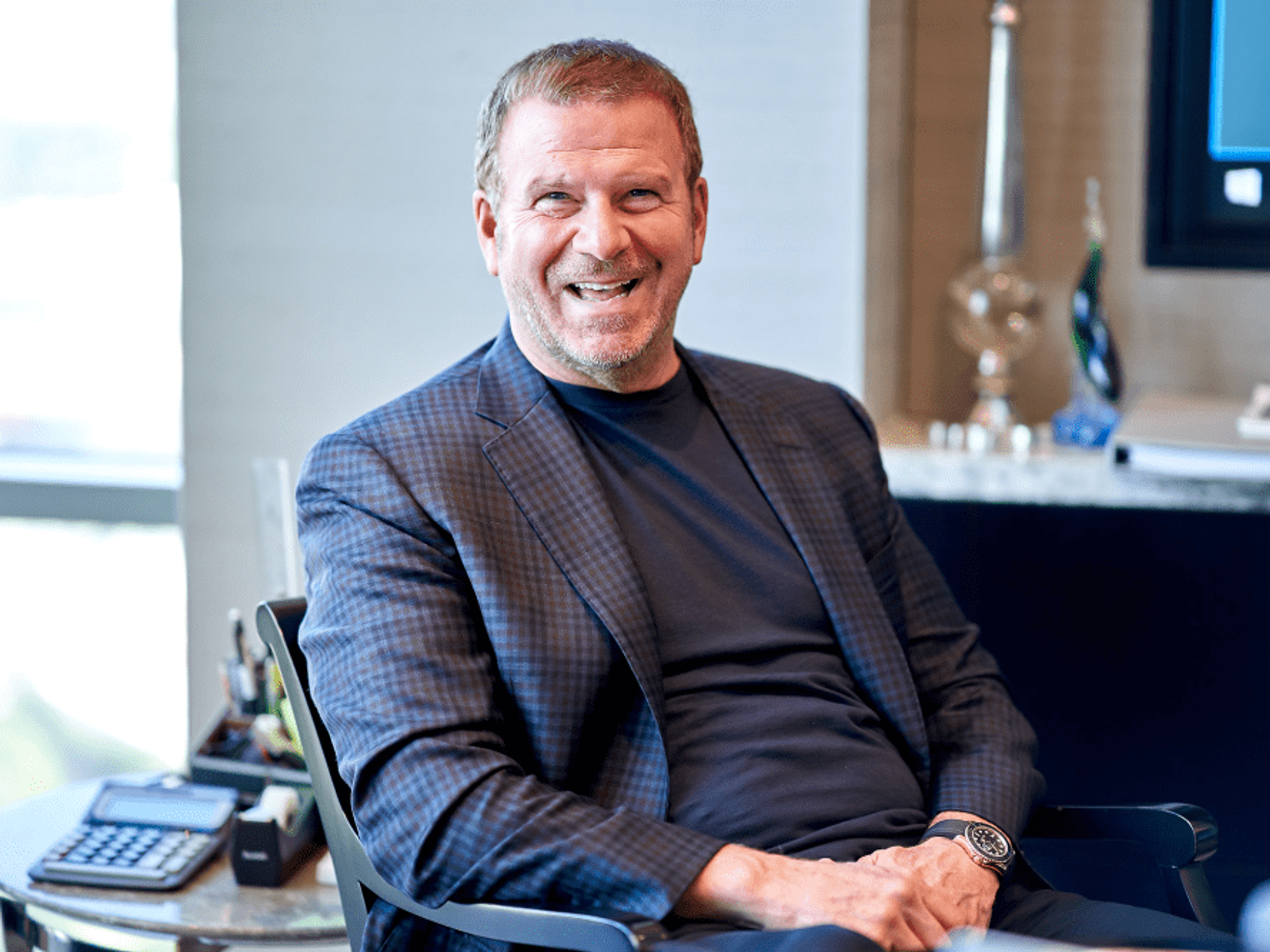 The billionaire owner has myriad reasons to be all smiles.