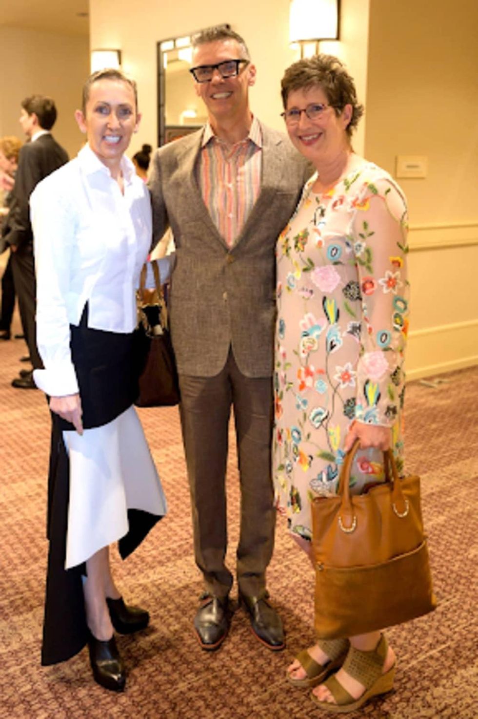 The Center luncheon Evelyn Maclean-Quick, Steve Quick, and Ashley Kress