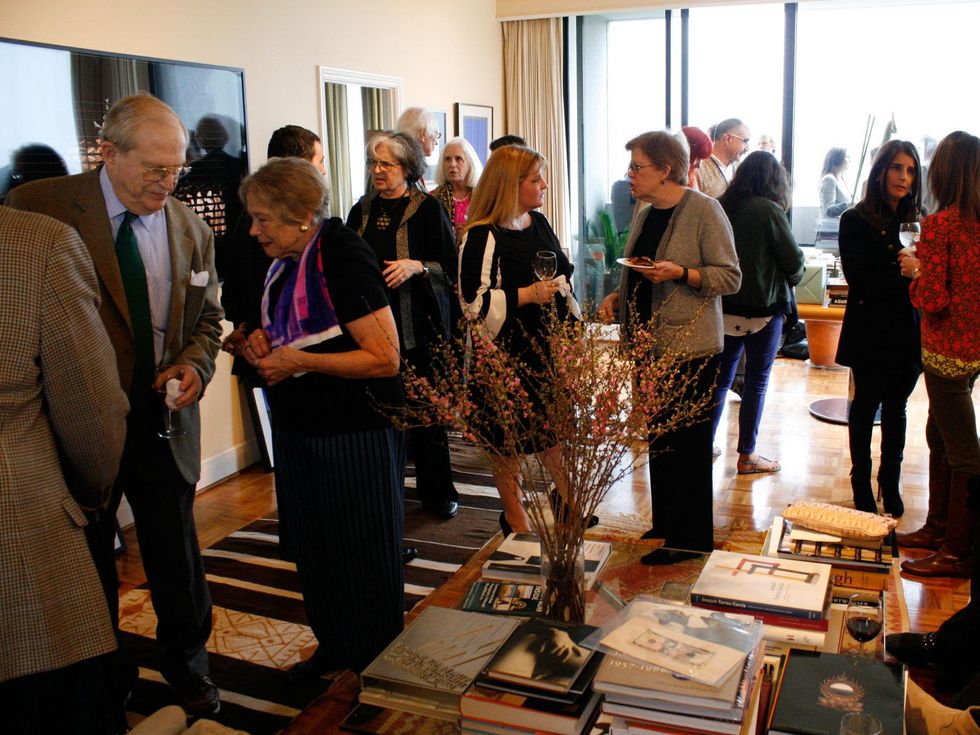 The crowd at at Slavka Glaser's FotoFest reception March 2014