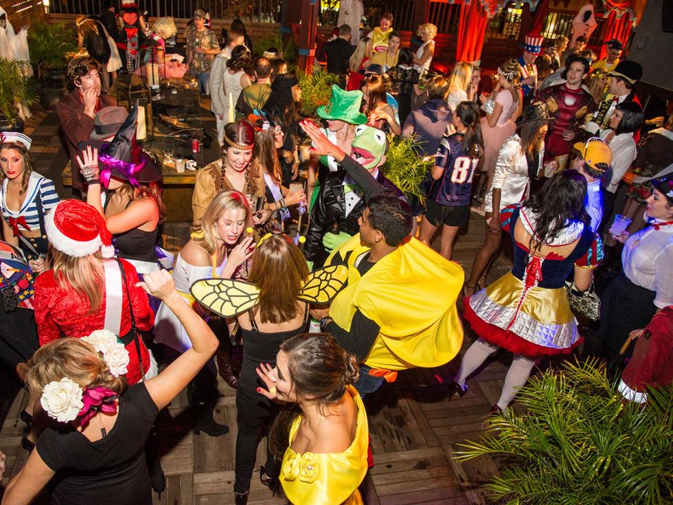 The crowd at the St. Luke's PULSE Saints & Sinners Halloween party October 2013