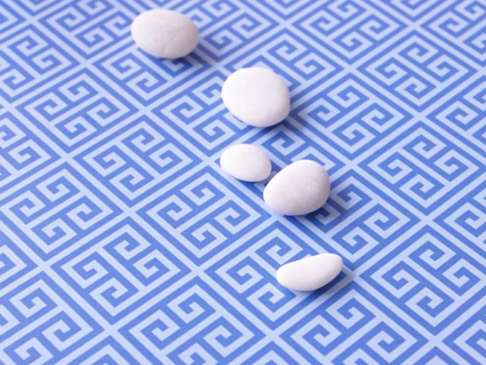 The Formica Laminate Jonathan Adler collection February 2015 Greek Key on wall and Lacquered Linen on counterop