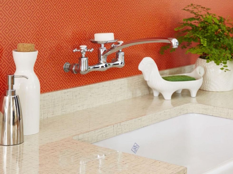 The Formica Laminate Jonathan Adler collection February 2015 Greek Key on wall and Lacquered Linen on counterop