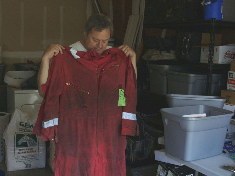 The Great Invisible Doug Brown, chief mechanic on the Deepwater Horizon, shows the uniform he was wearing the day of the explosion
