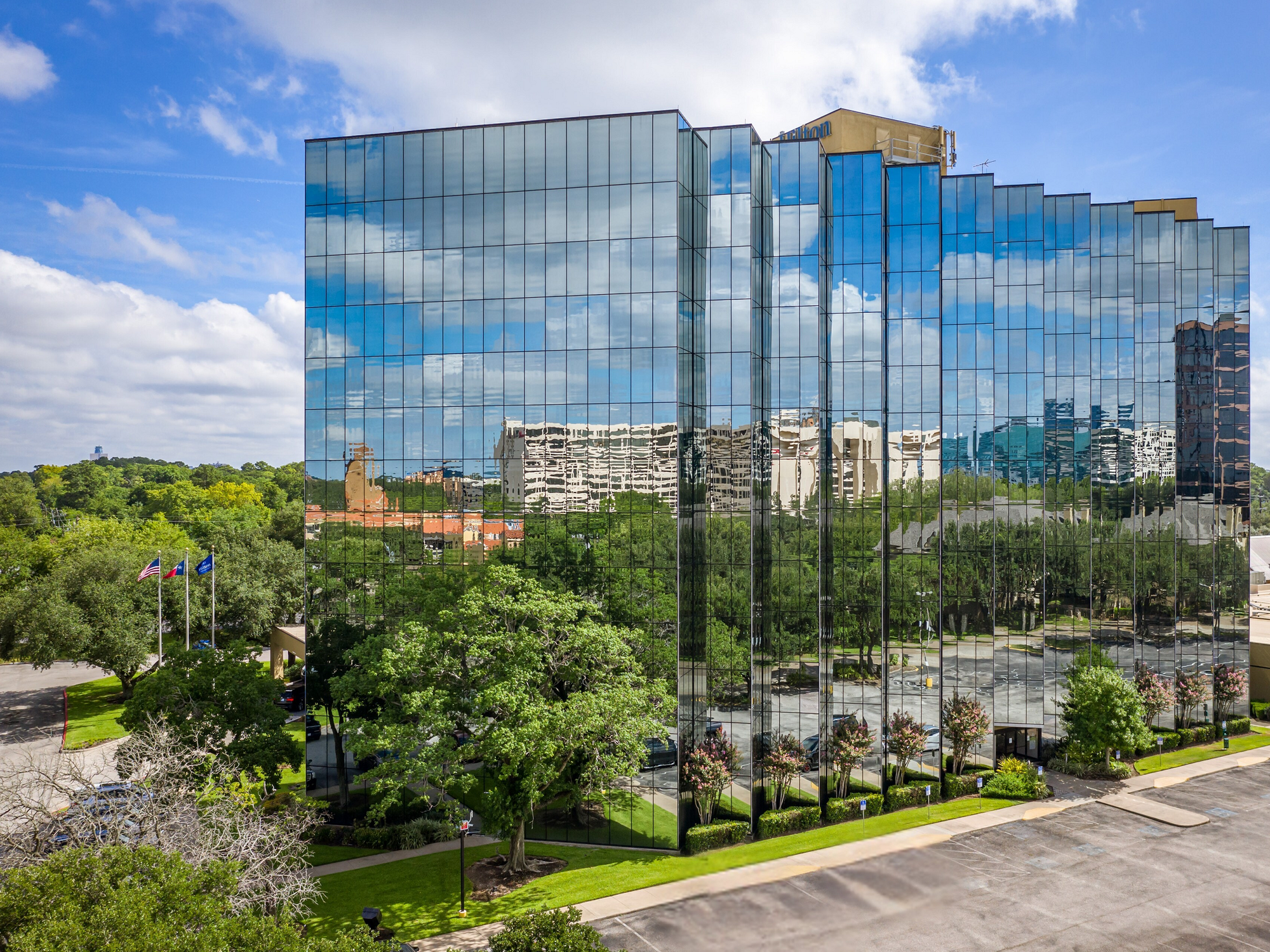 The Hilton Westchase in Houston during daylight.