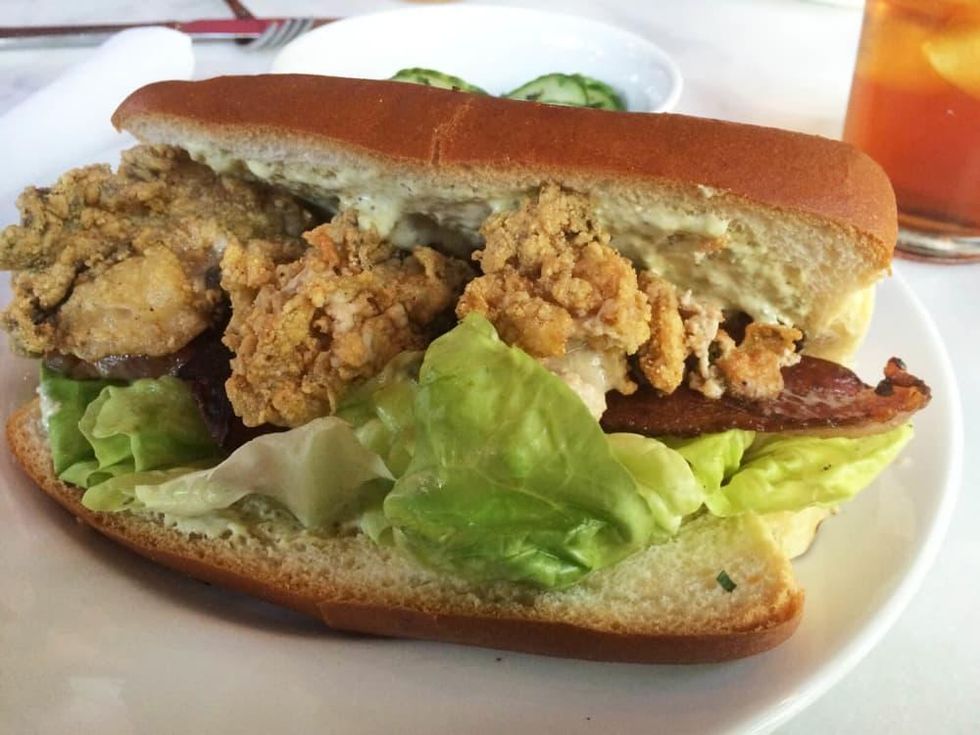 The Honeymoon restaurant interior with crowd fried oyster sandwich with bacon and lettuce September 2014