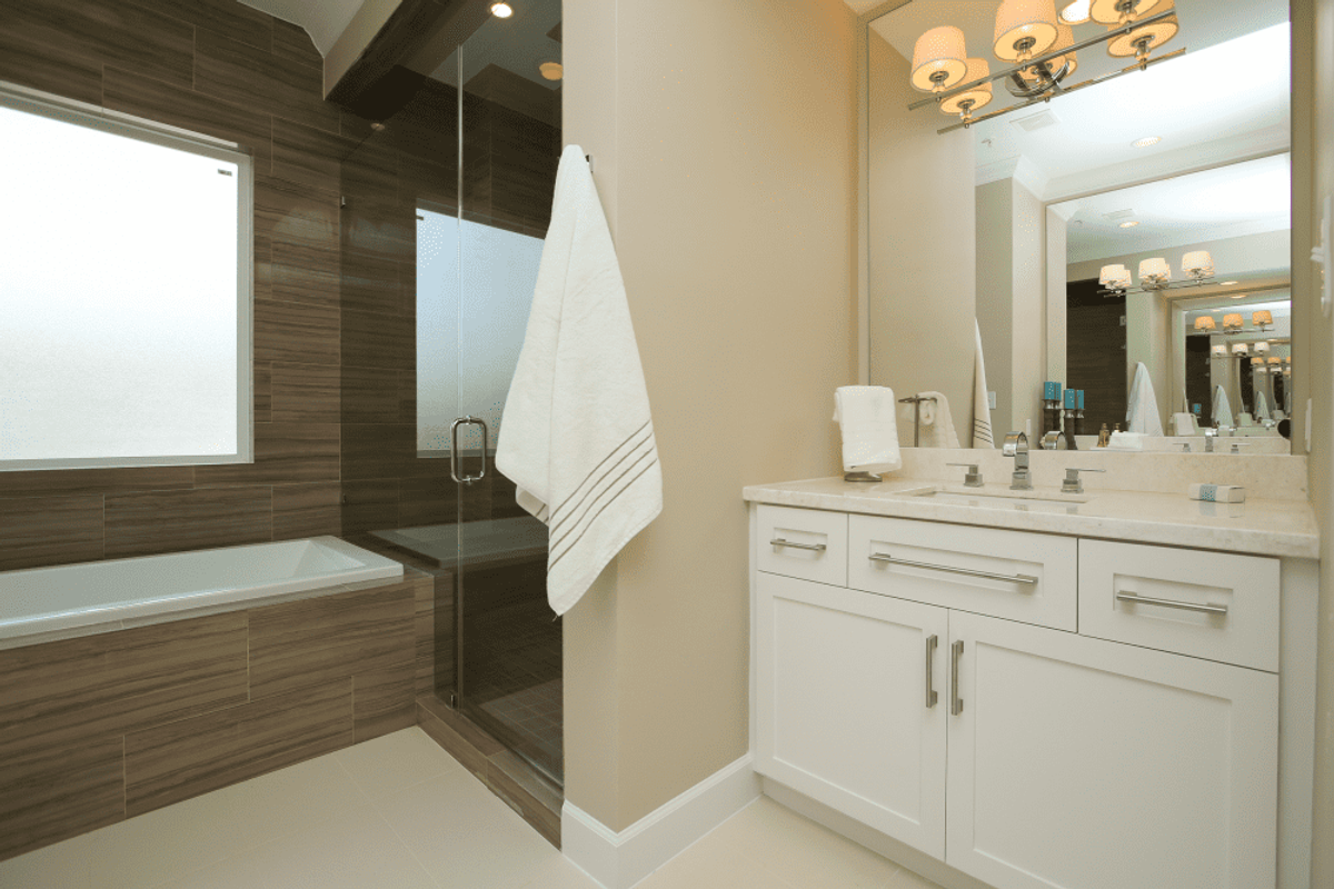 The master bath features walkin shower and tub. CultureMap Houston