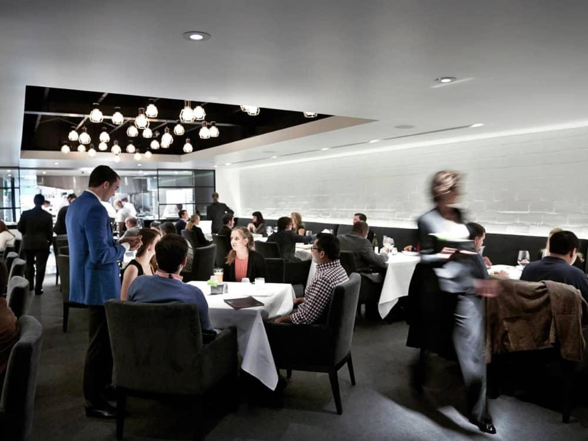 The Pass & Provisions Houston restaurant interior dining room crowd