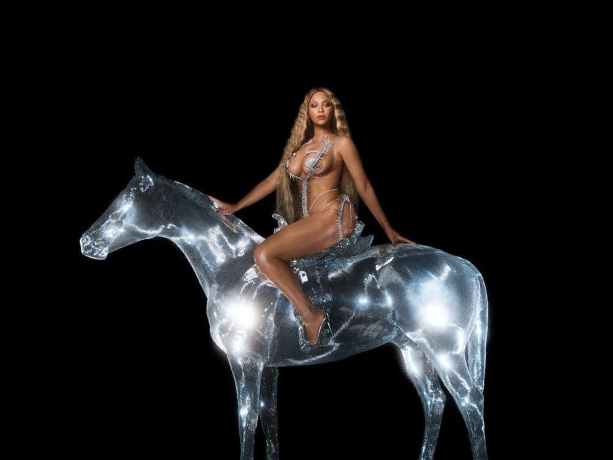 The Queen, on horseback.