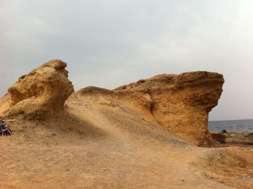 The rock known as Ras Shitan is located where two beaches meet Sinai Egypt
