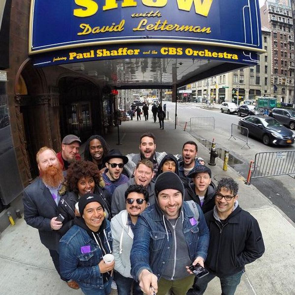 The Suffers pose in front of David Letterman show theater
