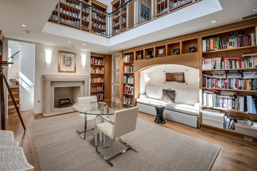 The two-story library of 119 Carnarvon Drive