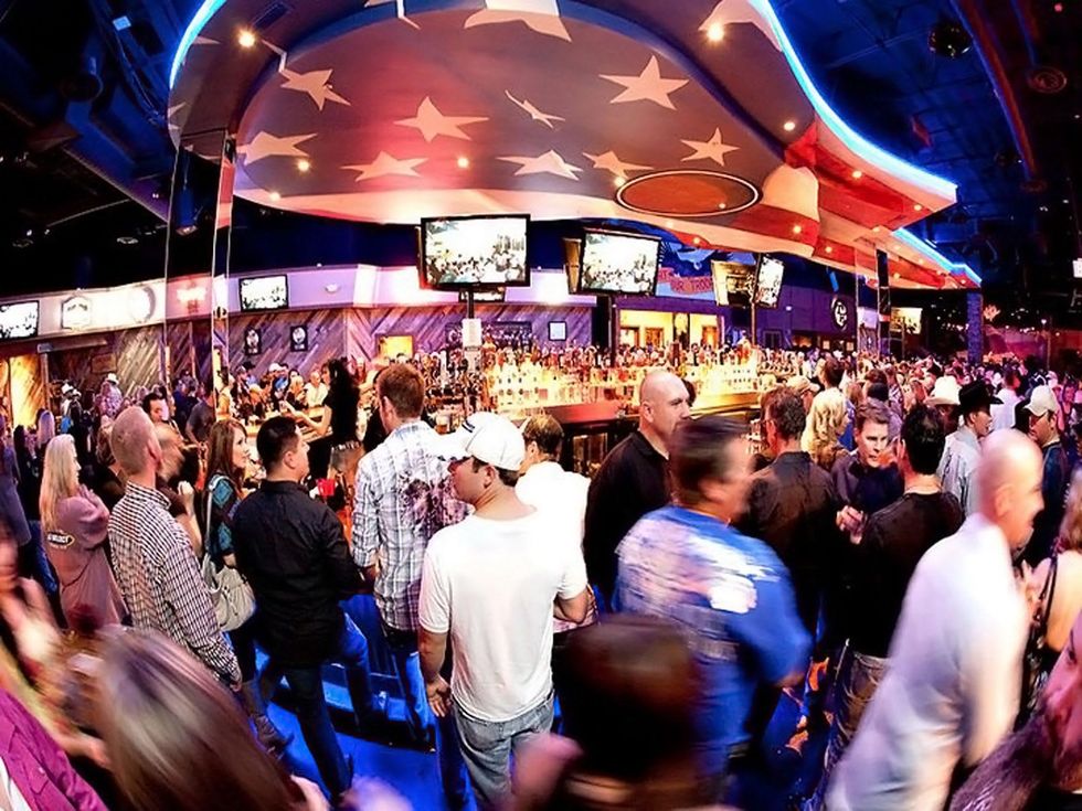 Toby Keith's I Love This Bar and Grill Houston interior with crowd