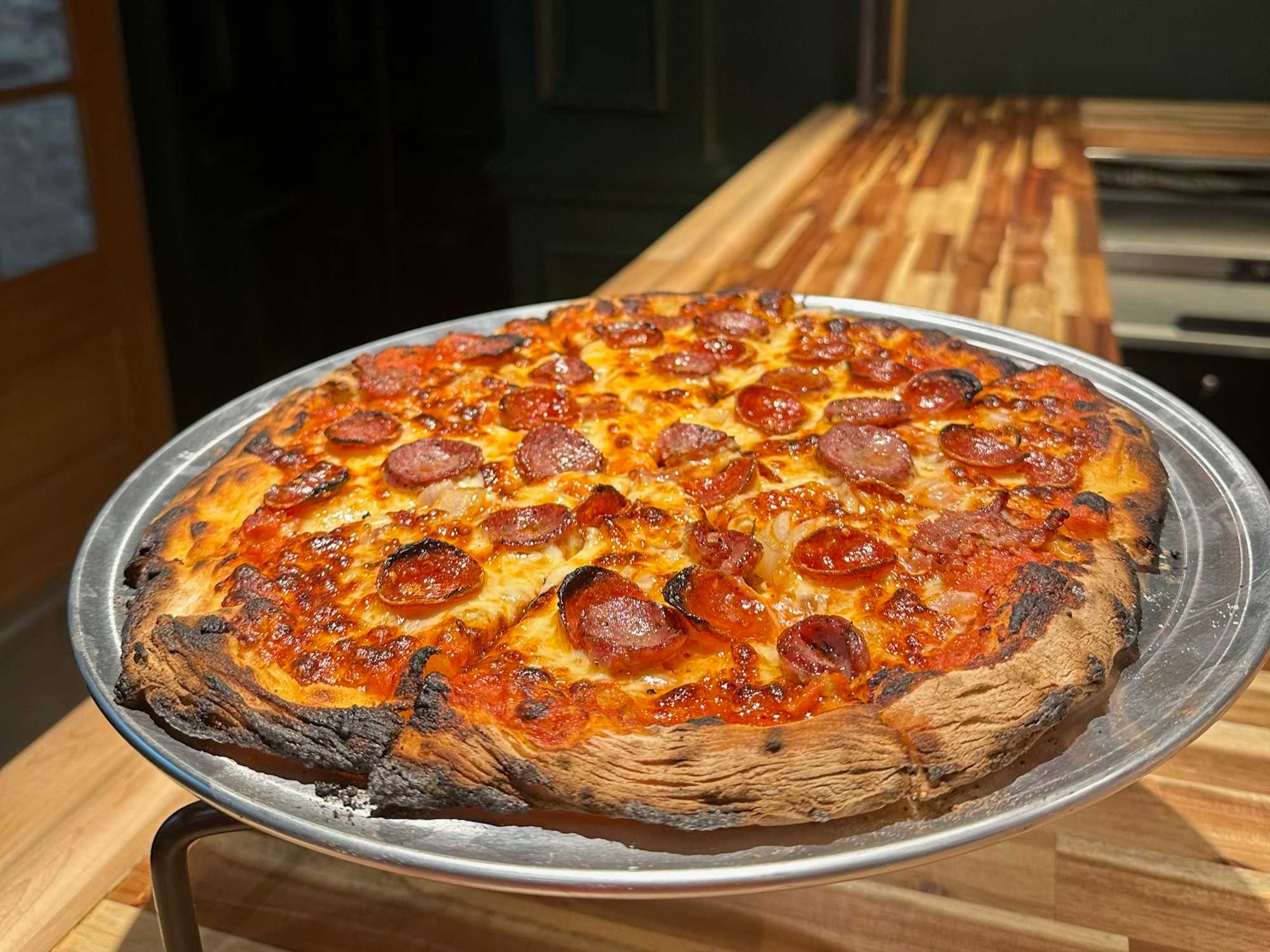 Tomball barbecue trio spins up new tavern devoted to pizza and burgers