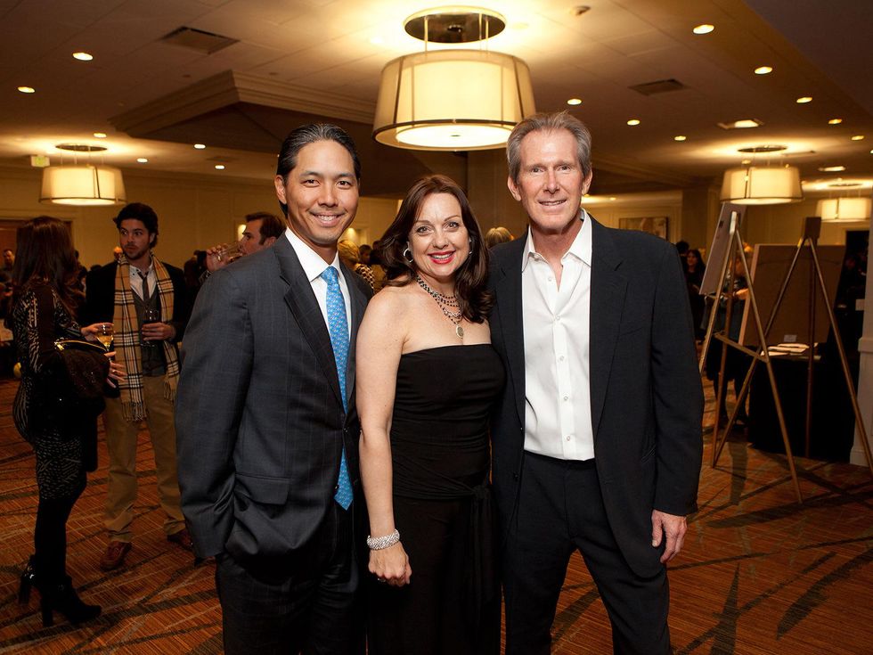 Tommy and Marcelle Ho, from left, with Keith Christman at the Houston Tennis Association Gala February 2014