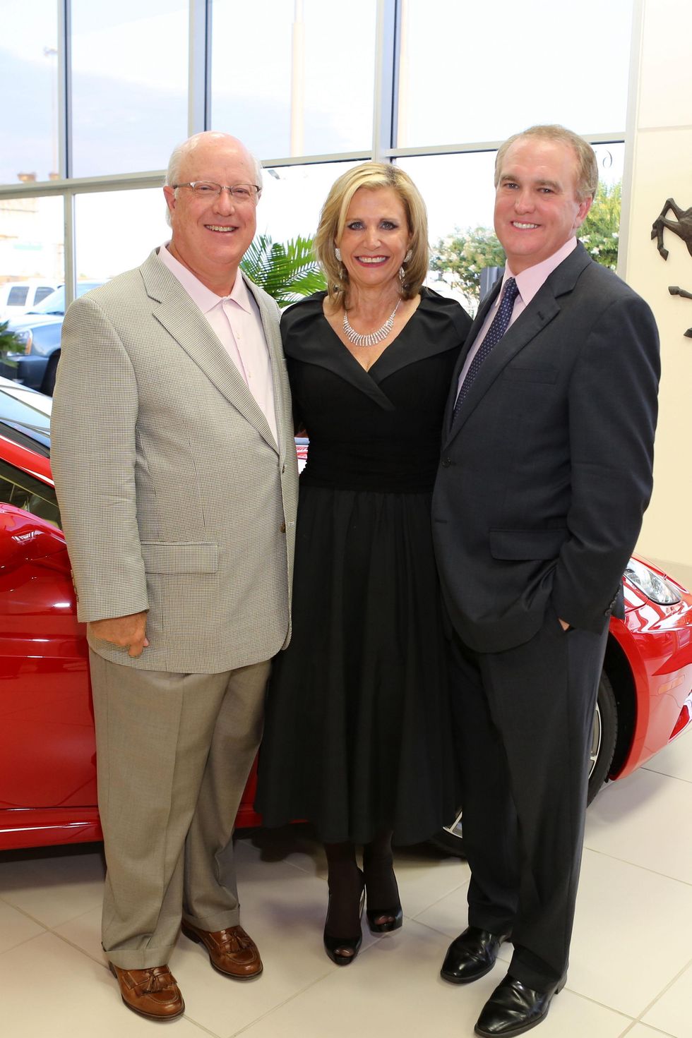 Tommy Proctor, from left, Melanie Campbell and Doug Miller at the Joints in Action at Ferrari of Houston June 2014
