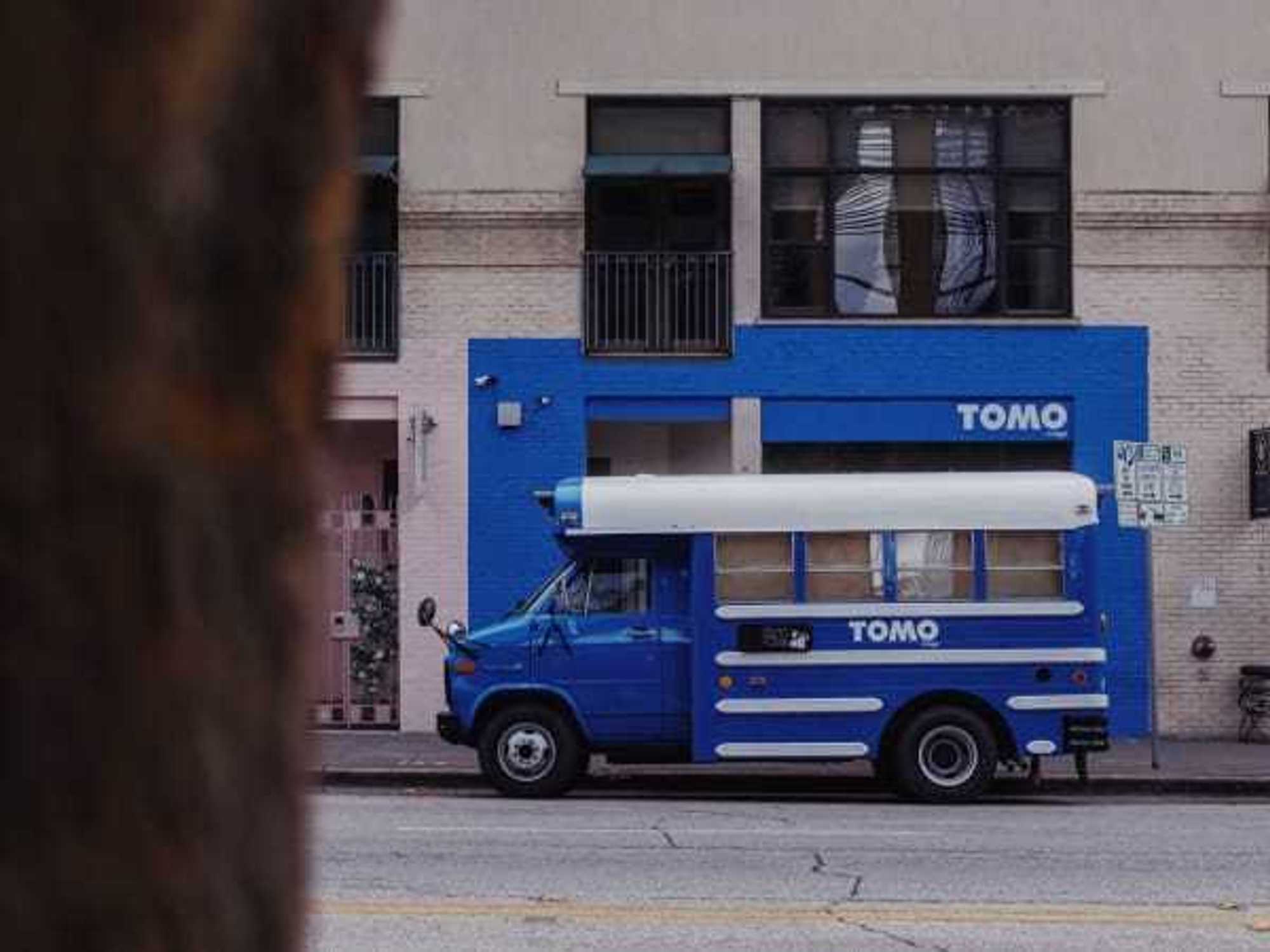 Tomo Mags bus outside of brick-and-mortar Austin store